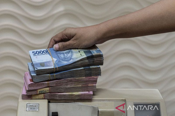 Rupiah Jumat pagi melemah jadi Rp18.074 per dolar AS